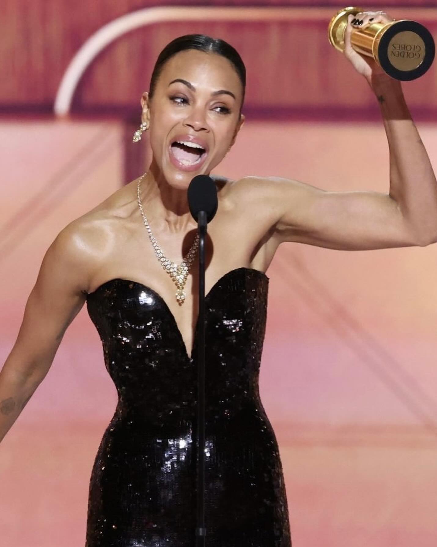 zoe saldana dress golden globes 2025 Saldaña wins Best Performance by a Female Actor in a Motion Picture during the 82nd Annual held at The Beverly Hilton on January 05, in Beverly Hills, California! black party dress
