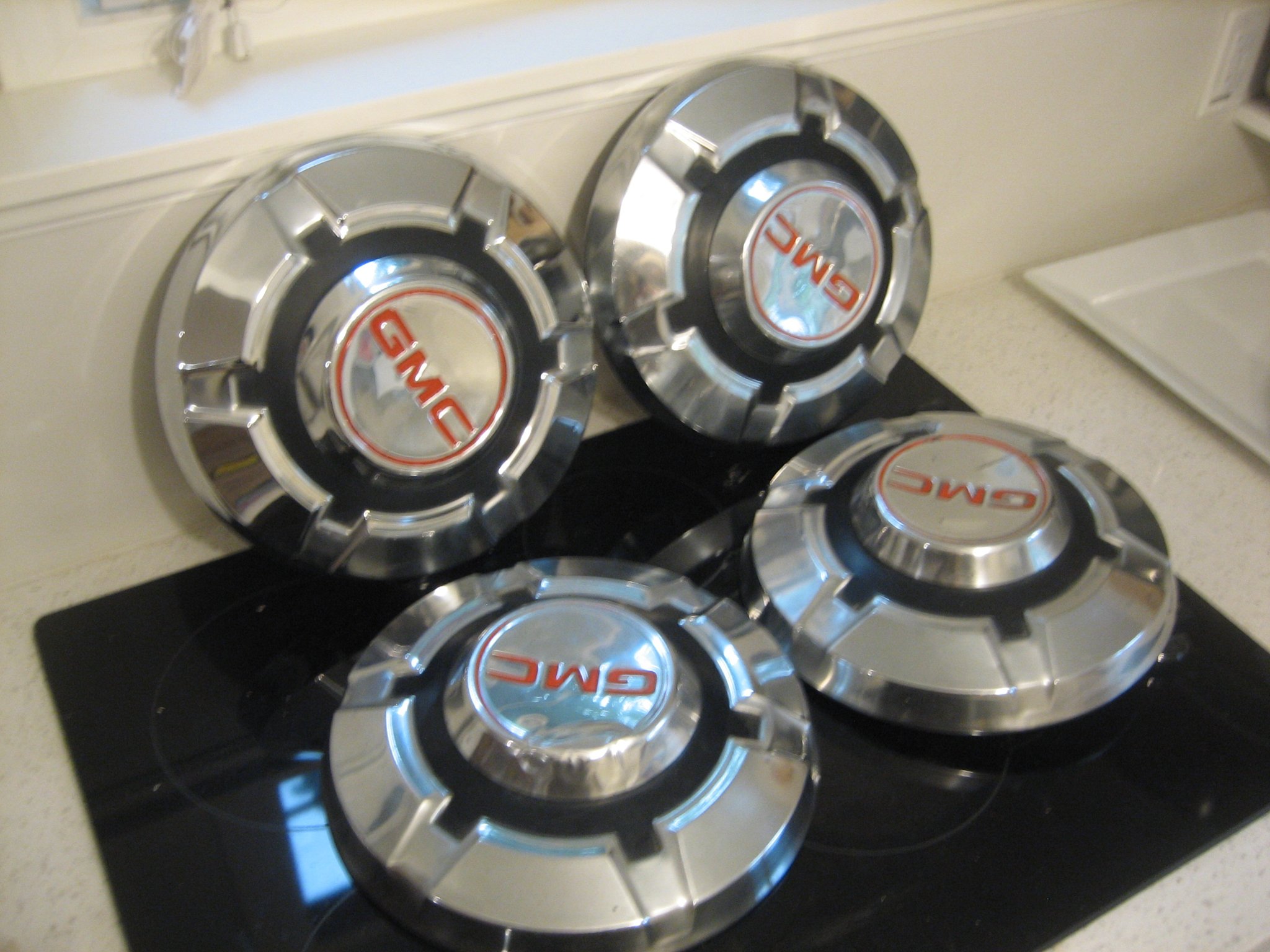 Field and Barn Finds- Canada | Full set of (4) GMC chrome hubcaps for ...