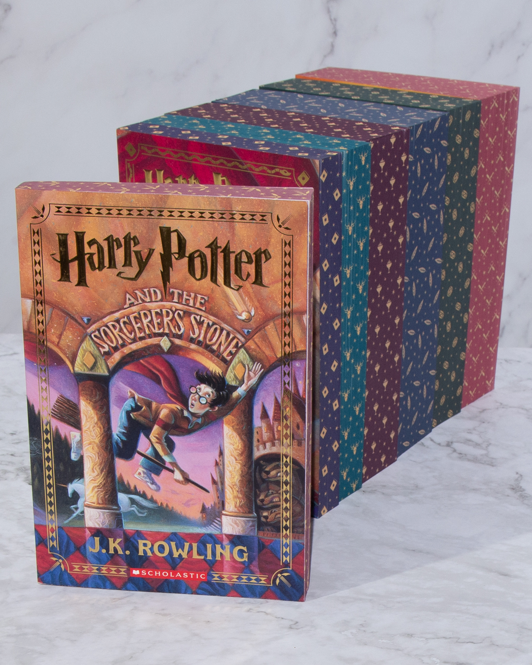 Deluxe Harry Potter books with stenciled edges