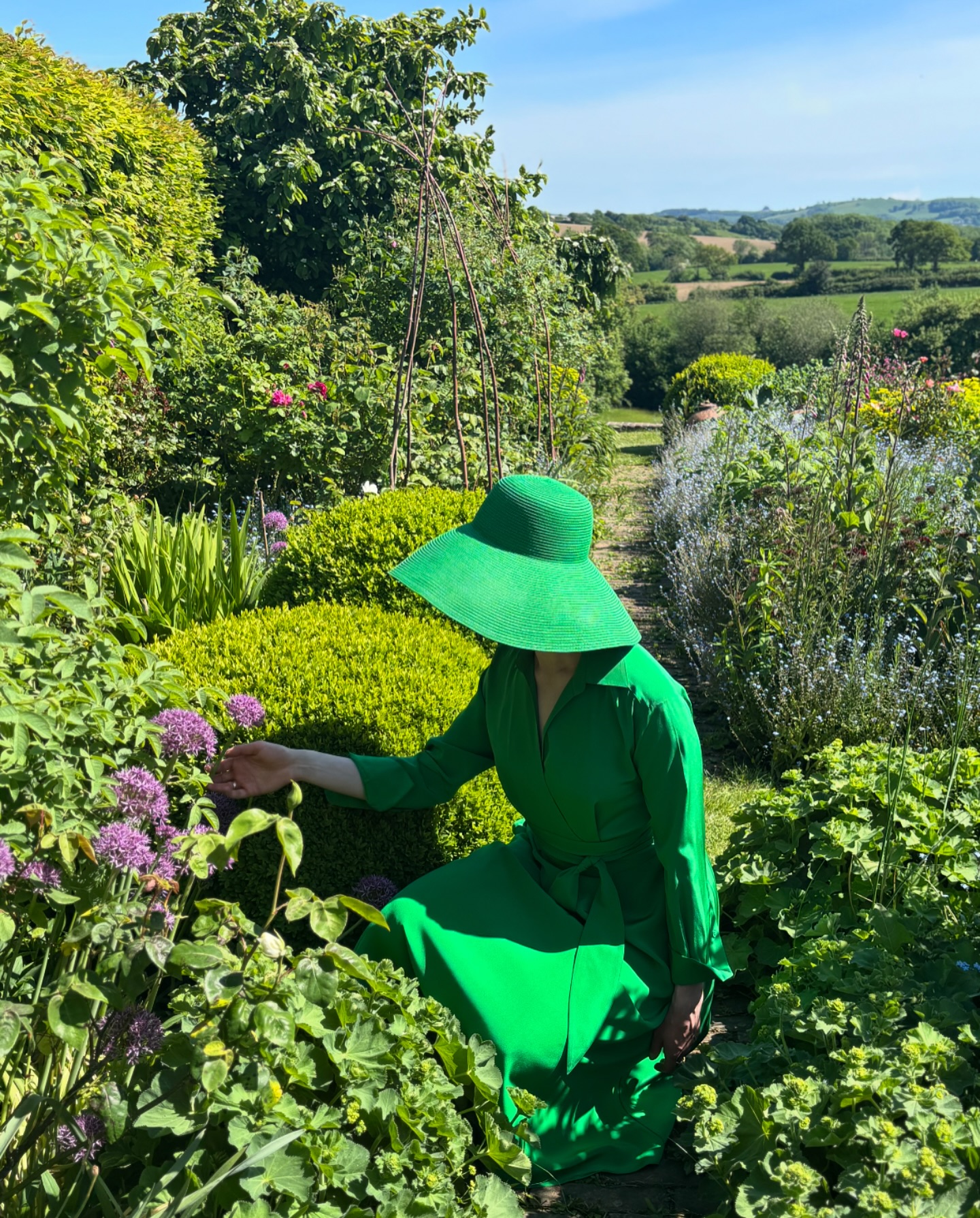 jasper conran green dress Celia in the sunshine amongst the alliums. Shop SS25 silk dresses at www. jasperconran.com Floaty dresses