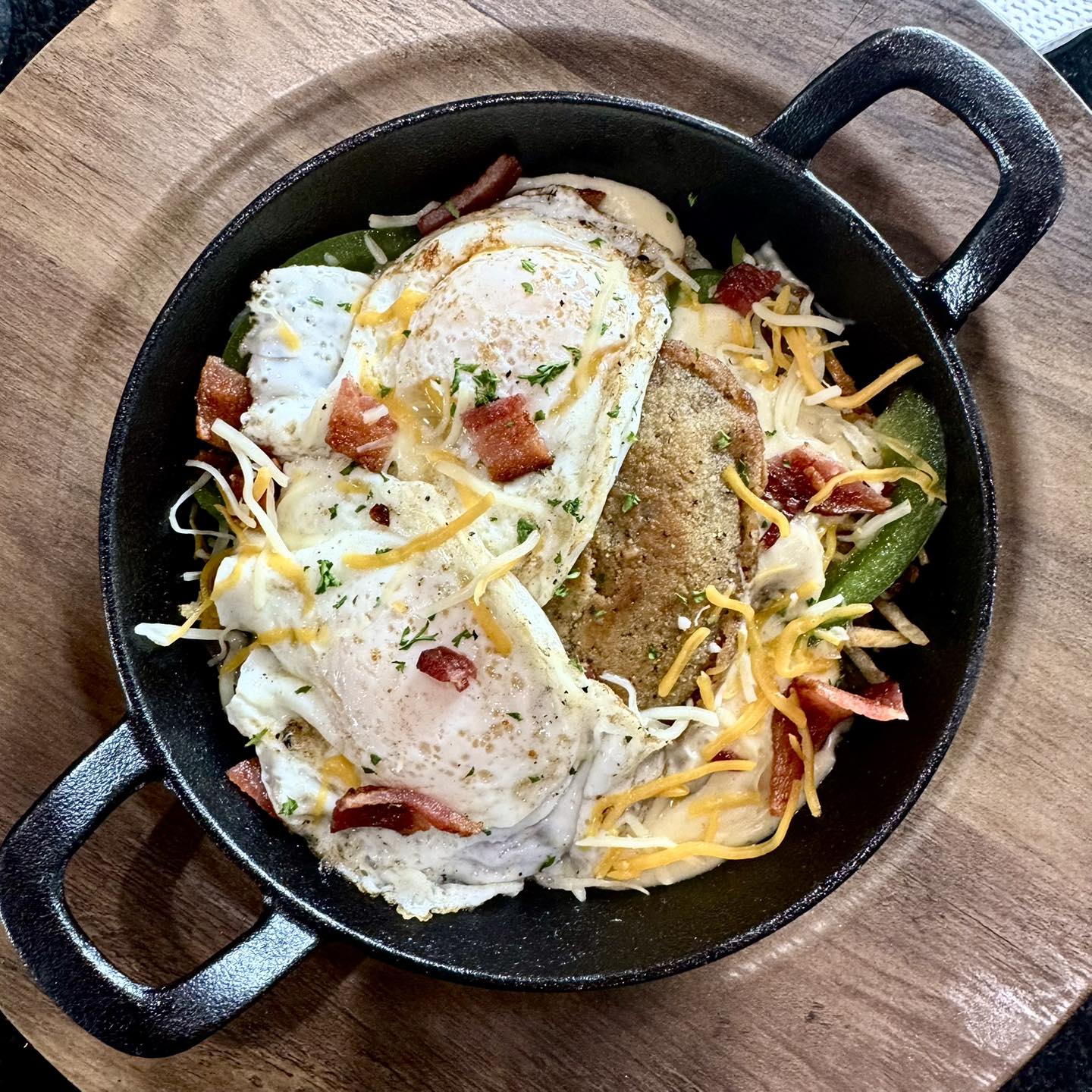 Guys - The Farmhouse Breakfast Skillet has it all: Two over-medium eggs ...
