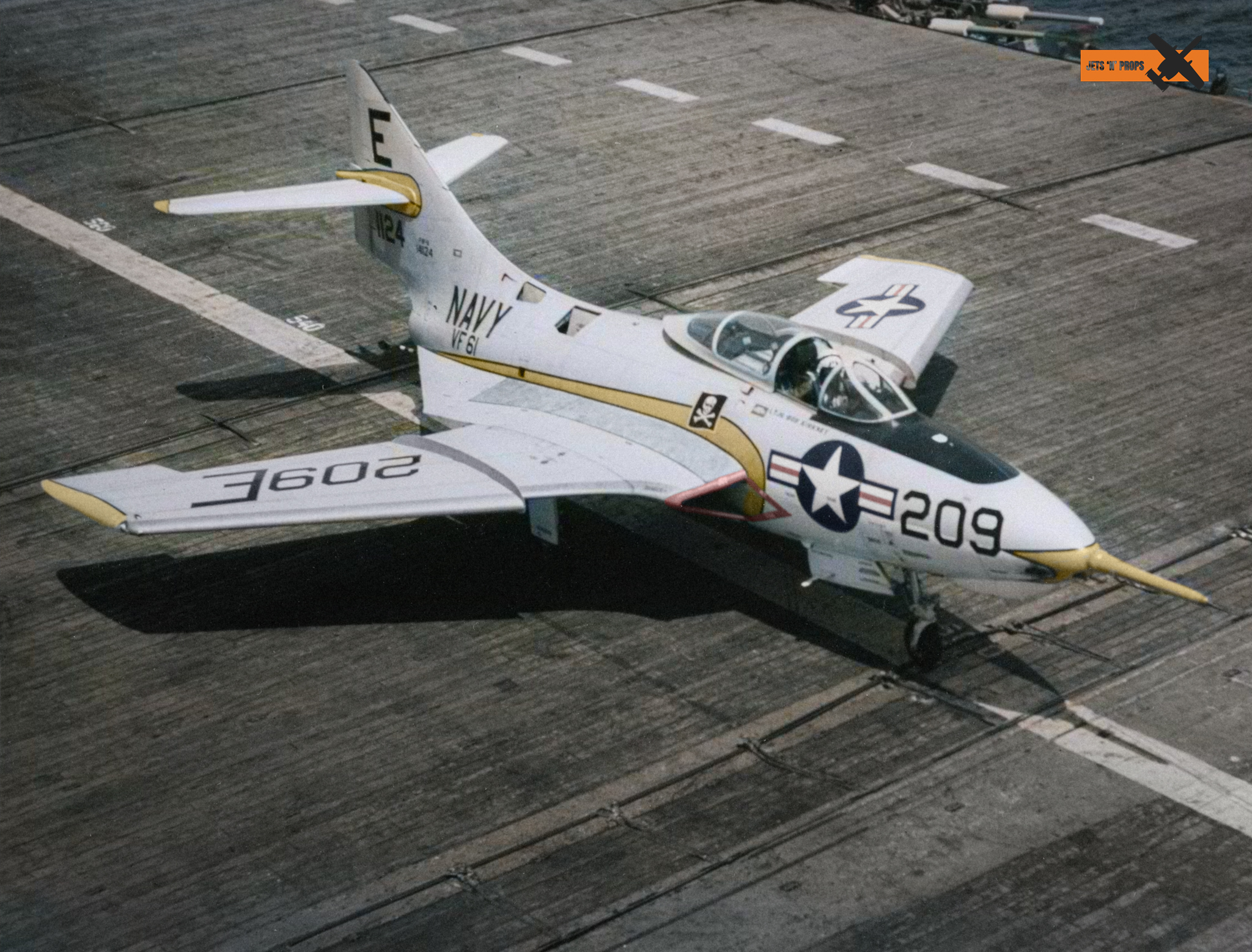 An F9F-8T Cougar of Training Squadron (VT) 22 pictured over Naval