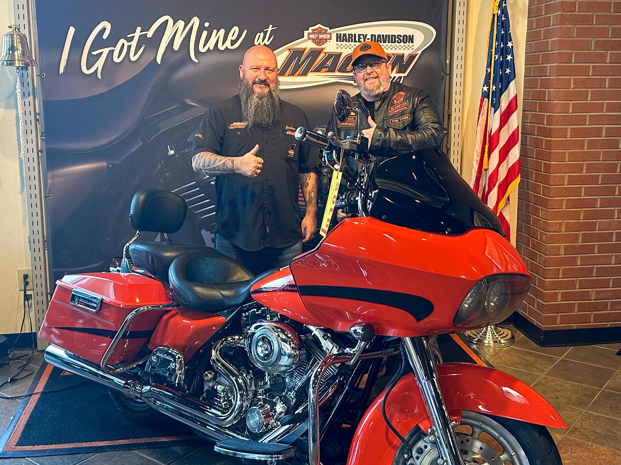 Jason picks up his 2007 lava orange Road Glide from Harley