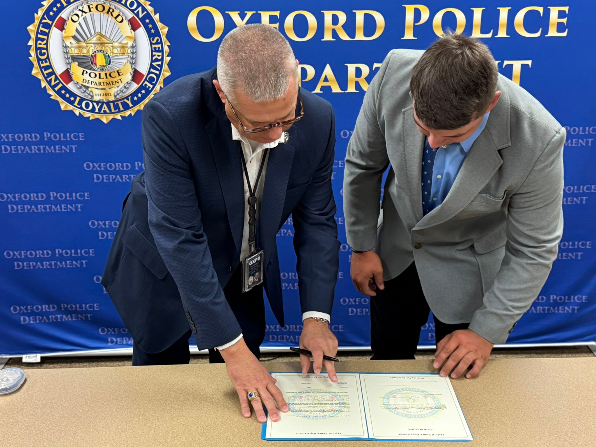 Oxford Police Department - Nick Reeves taking his oath. | Facebook
