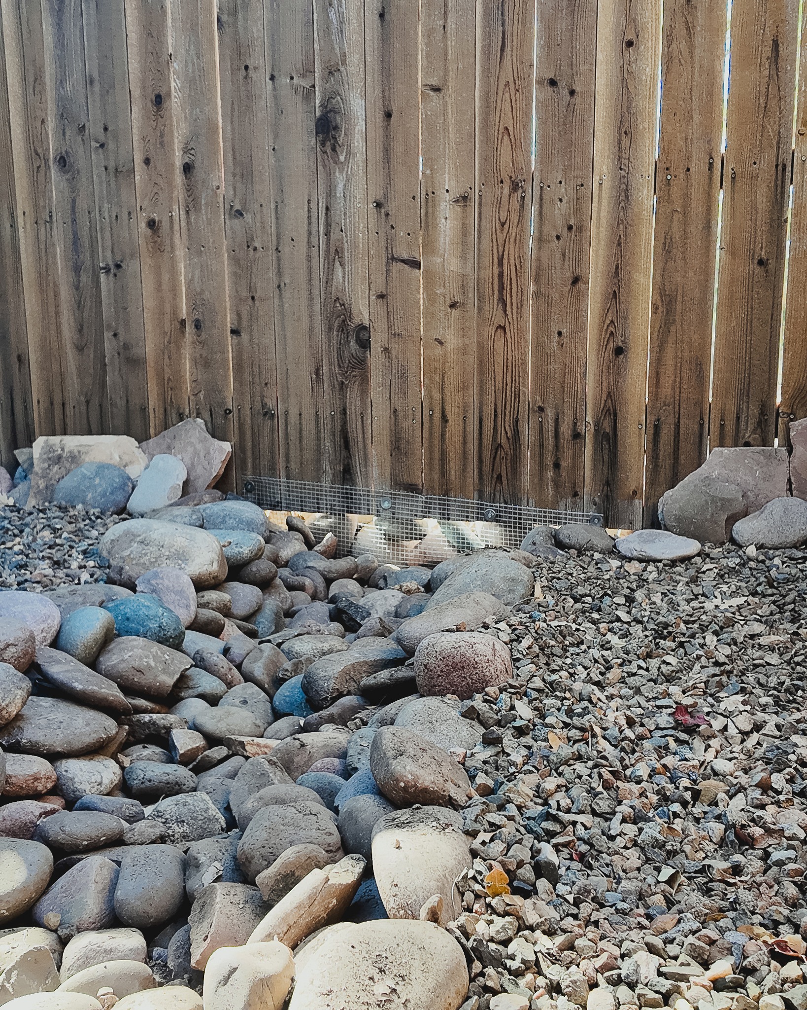 We recently completed a swell using river rock for rip-rap to 