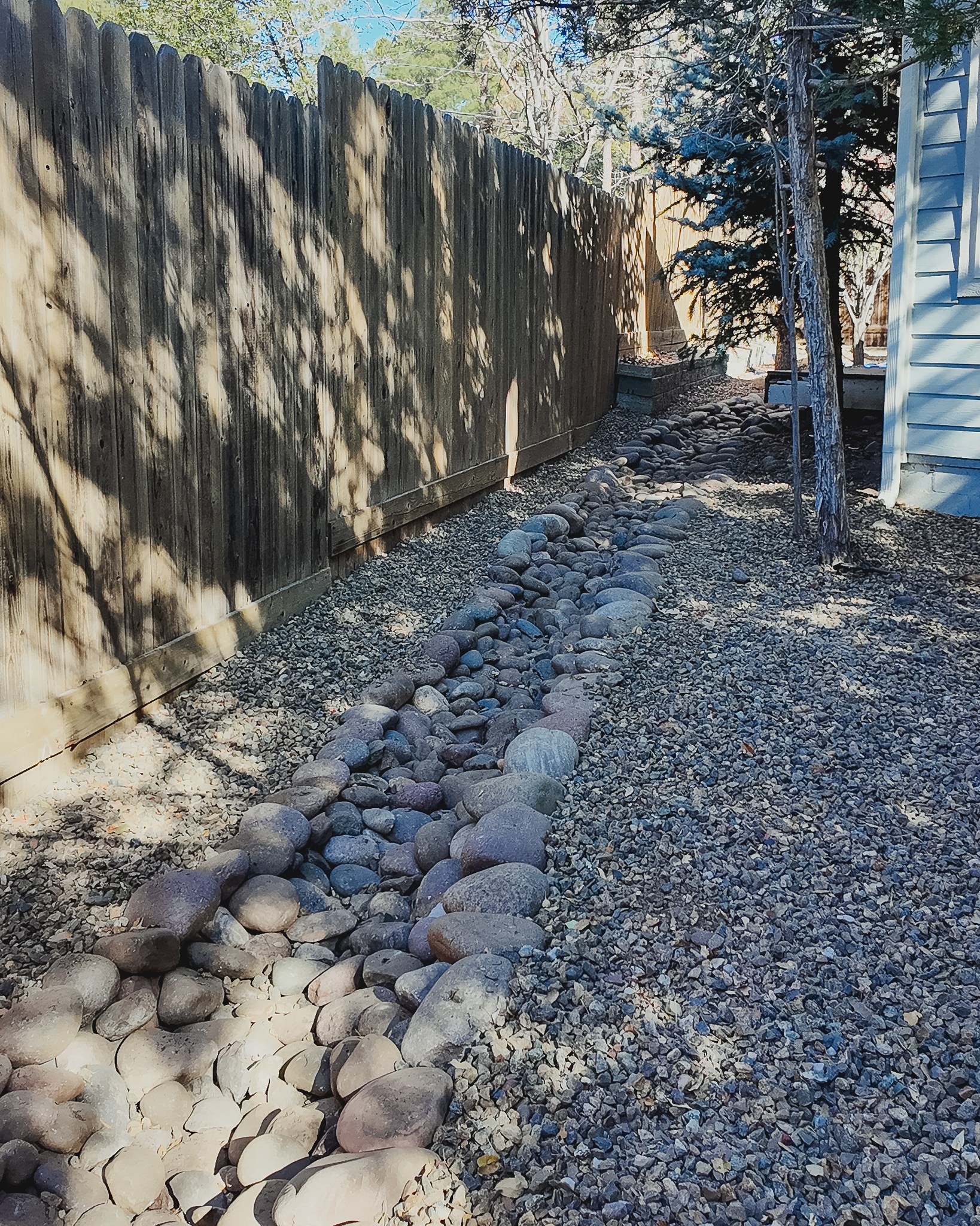 We recently completed a swell using river rock for rip-rap to 