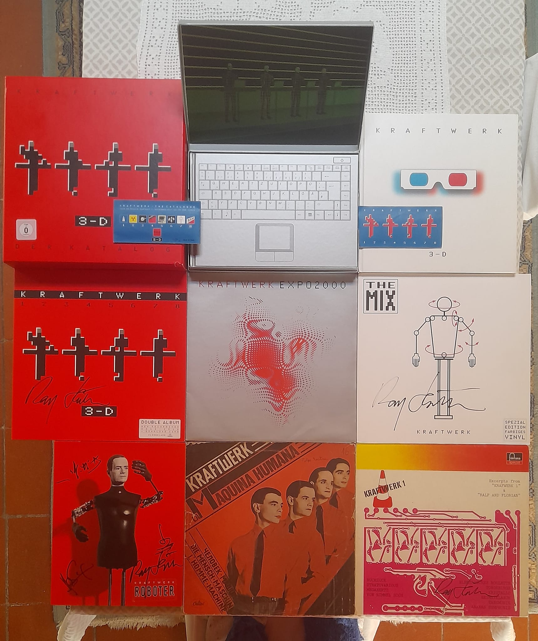 Rare Kraftwerk collection items including autographed books and vinyl