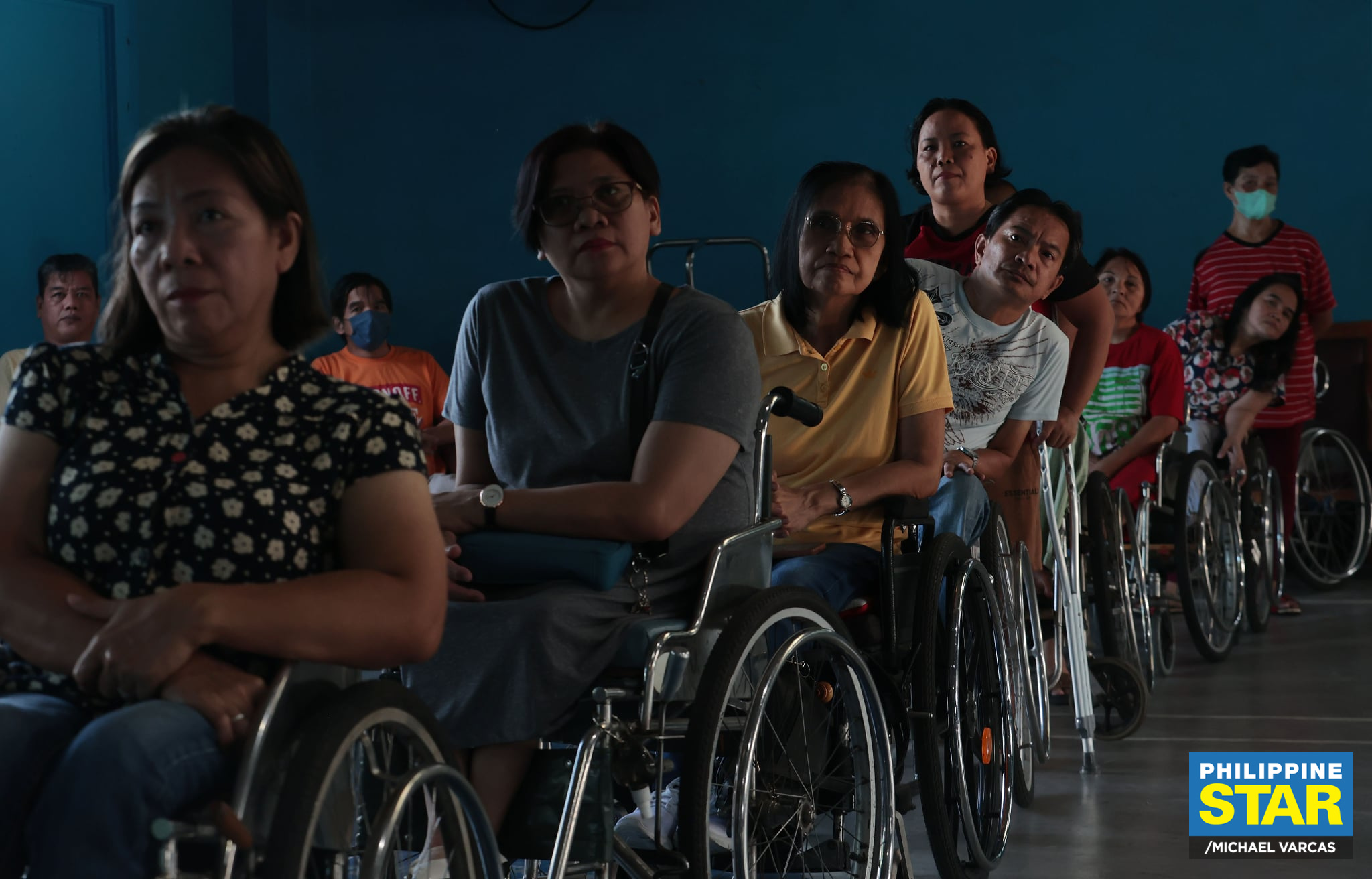 Philippine - Persons with disabilities (PWDs) line up to vote at ...