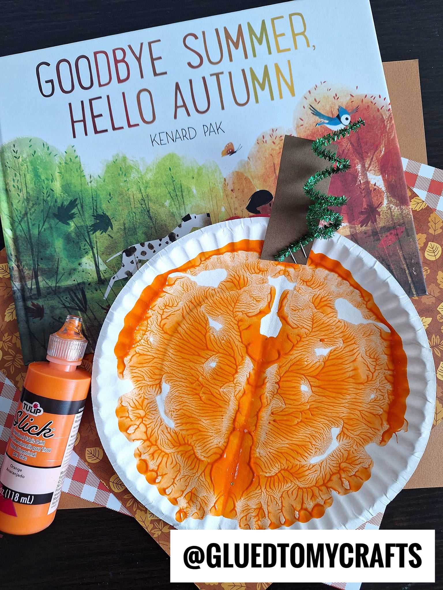 Glued - Pumpkin Craft Idea 🎃 Fold a large paper plate in half, add ...