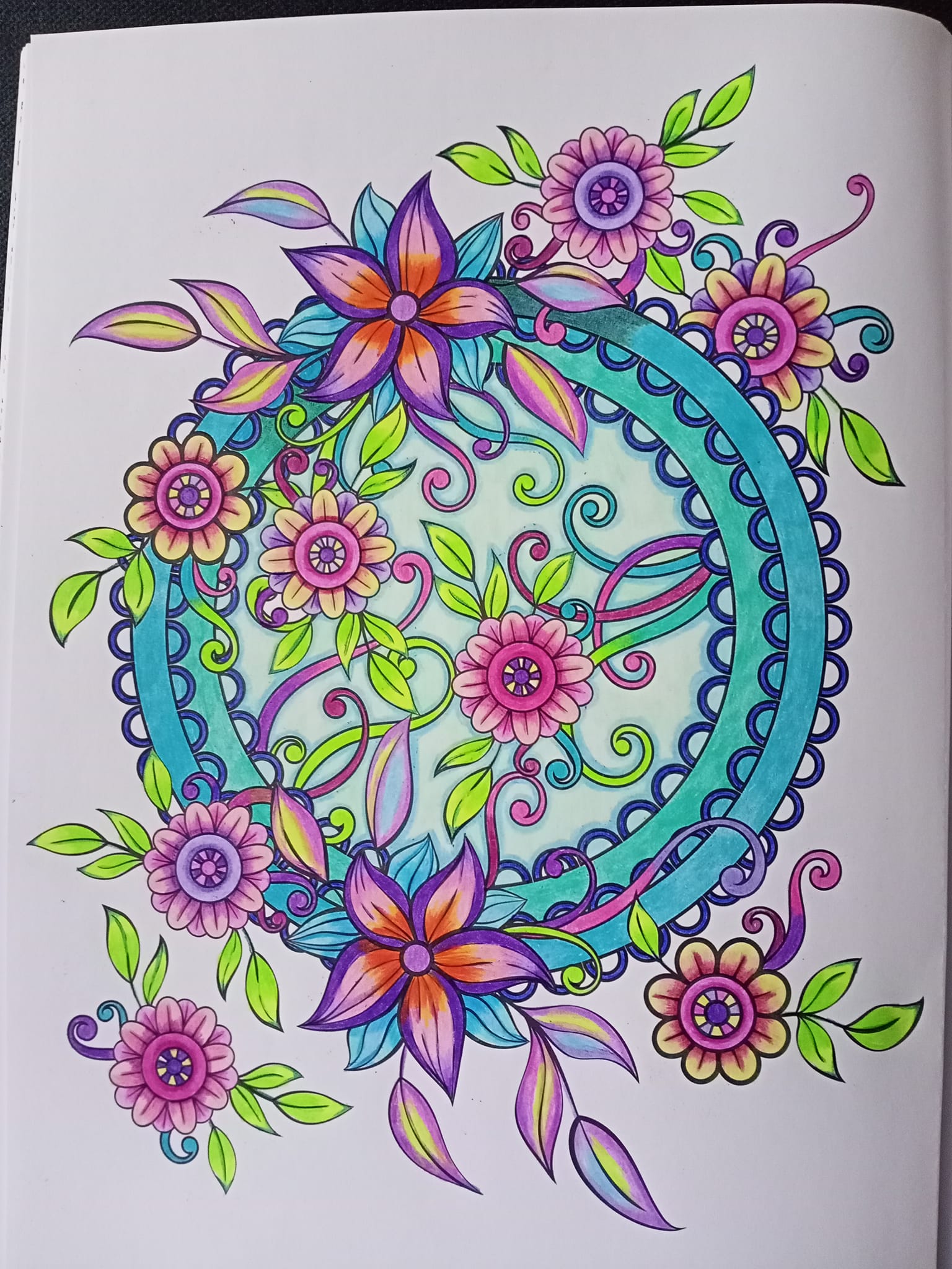 Art therapy coloring book with macaron pencils