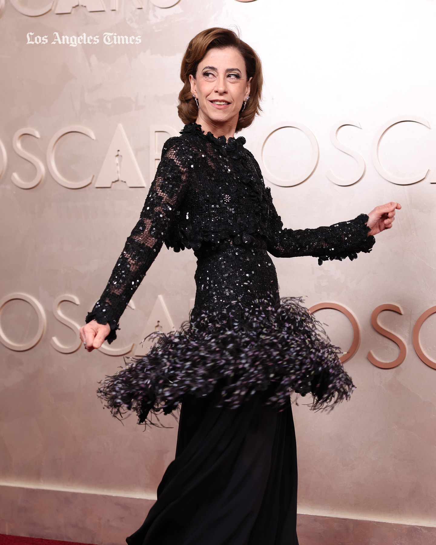 fernanda torres golden globes dress makes a grand entrance on the #Oscars red carpet. https://www.latimes.com/entertainment-arts/awards/story/2025-03-02/oscars-2025-red-carpet-fashion-best- dressed-photos?utm_medium=social&utm_source=facebook_Los_Angeles_Times fernanda montenegro golden globe
