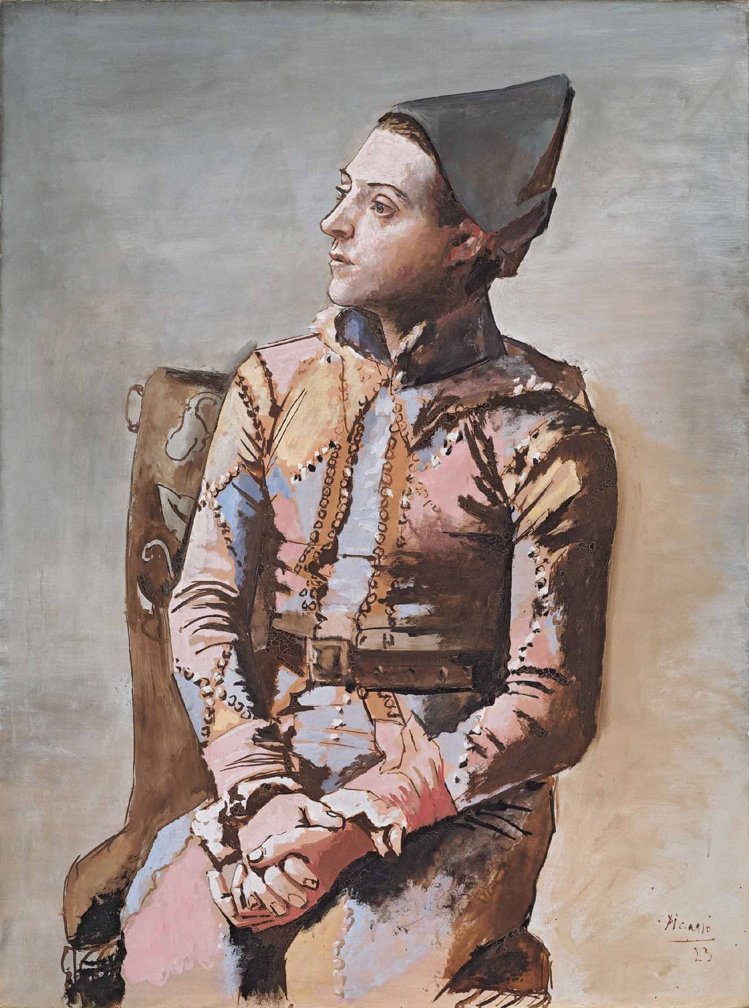 Pablo Picasso's Paulo as Harlequin with Flowers