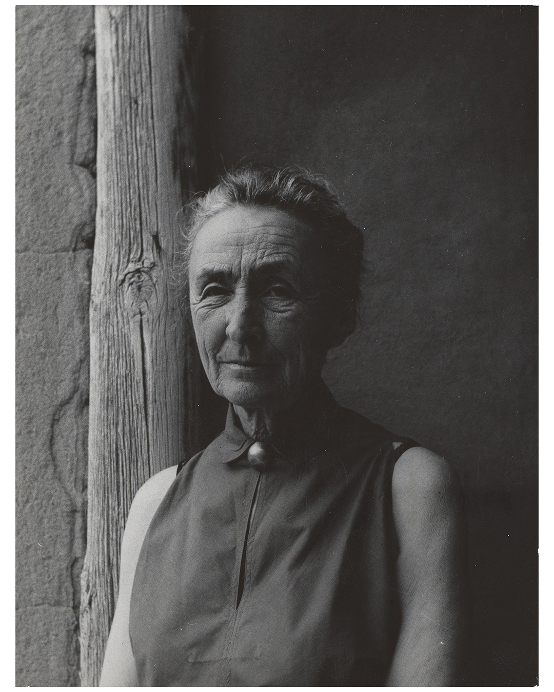 Georgia O'Keeffe is seen wearing her signature “OK” brooch—crafted