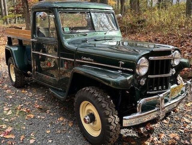This 1957 Jeep Willys 1-Ton Pickup is a thoroughly restored