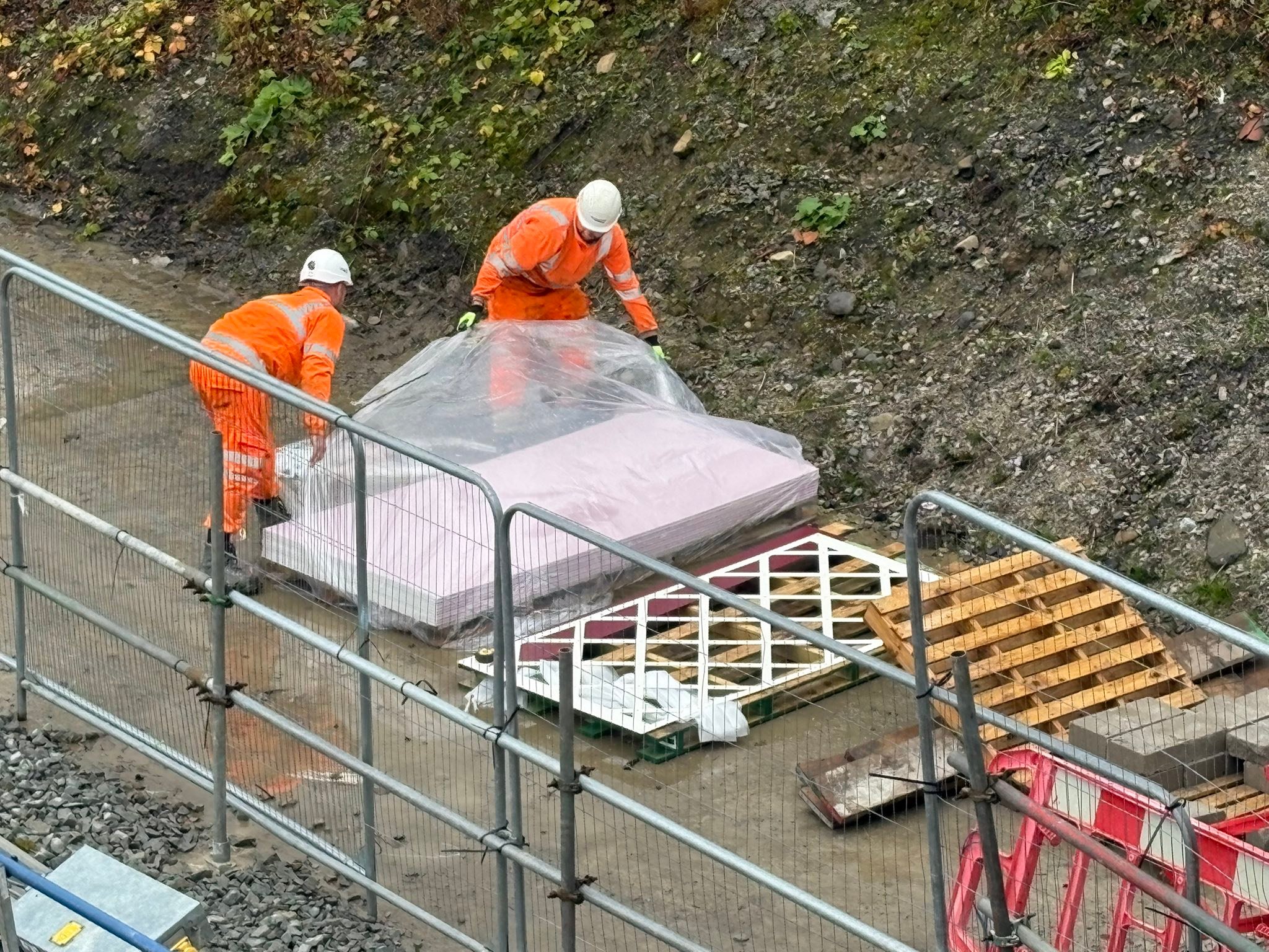 Ribble - The two workers are just getting another lattice panel from ...