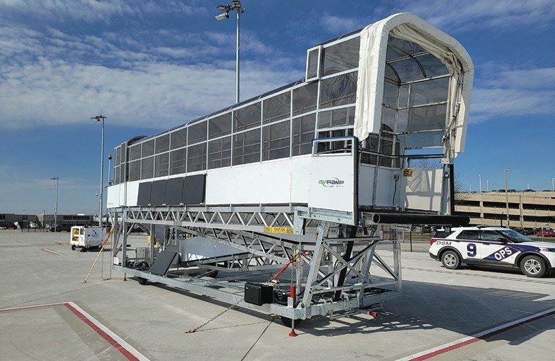 Airport - DSM International Airport Uses Portable Boarding Ramp to ...