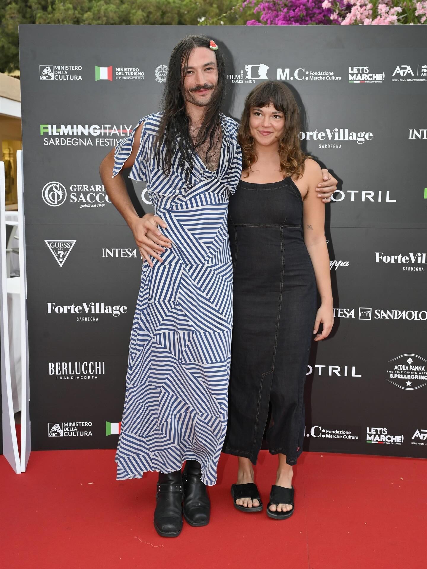 ezra miller green dress attends Day 3 of the 2025 Filming Italy Sardegna Festival in a alongside Joe Manganiello, Milla-Alexia Gojkovic, and Caitlin O'Connor. #FilmingItaly #EzraMiller #JoeManganiello #MillaAlexiaGojkovic #CaitlinOConnor Photos: Backgrid wedding ezra miller wife