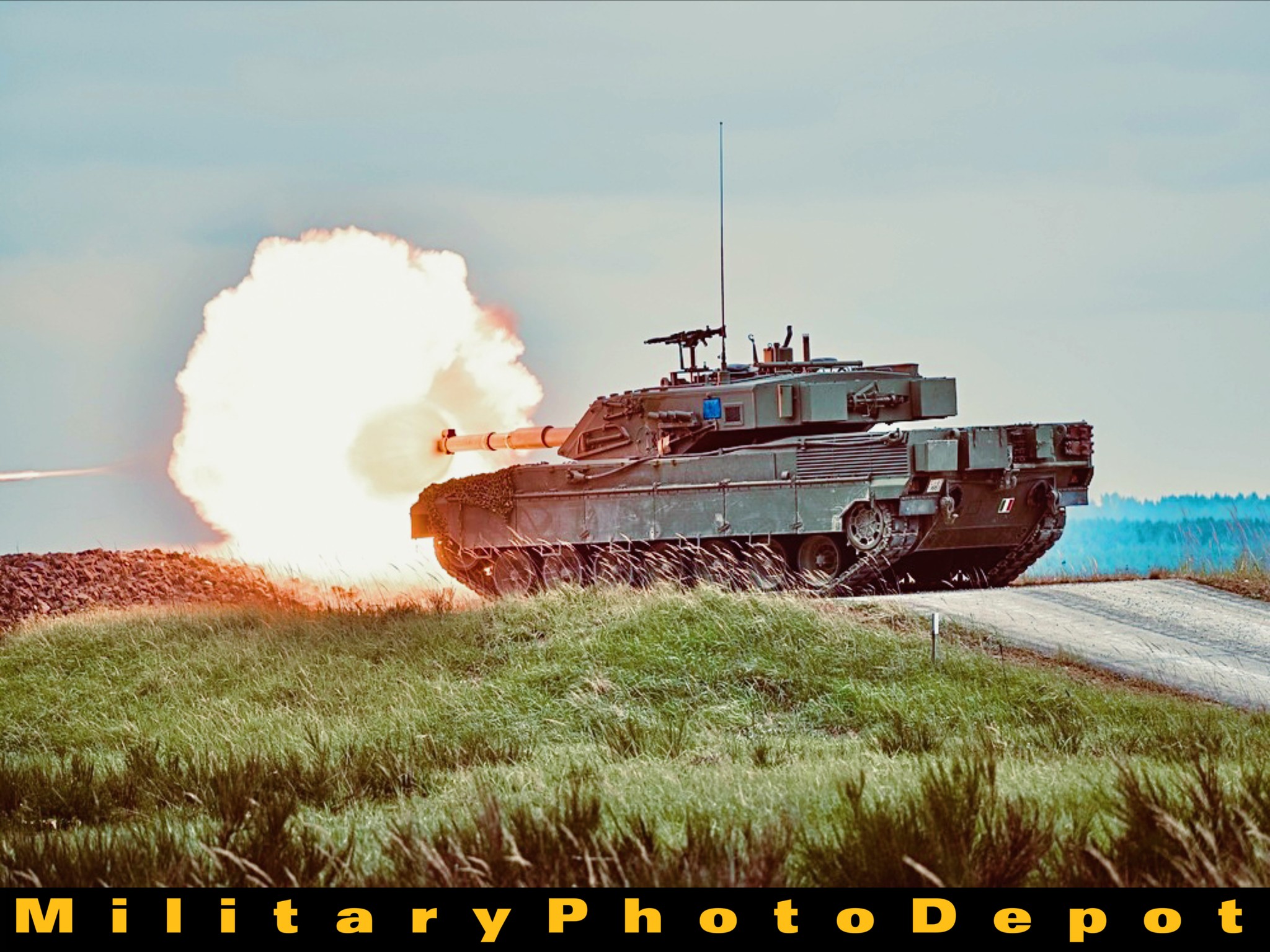 MilitaryPhotoDepot - An Ariete Italian tank fires at its target, during ...