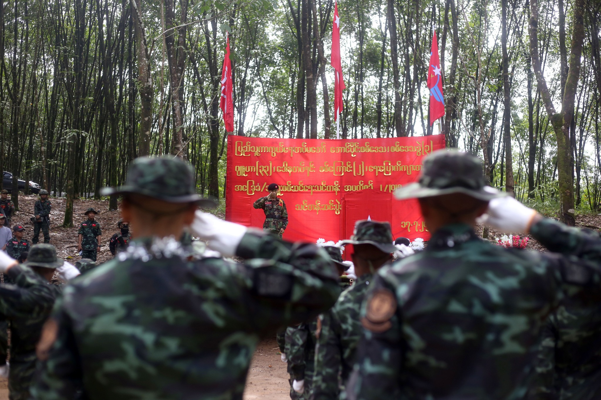 Mizzima - A head instructor (C) salutes the new cadets member of the ...
