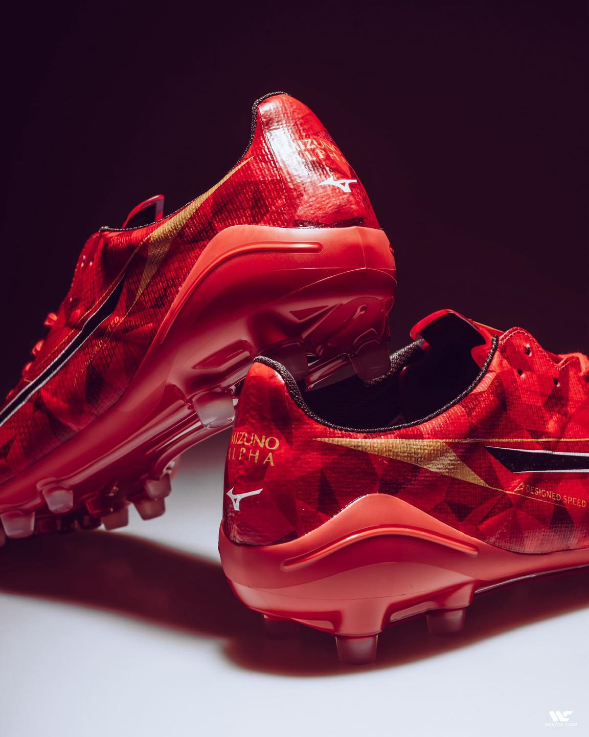 Redefine performance on the pitch with the Mizuno α II JAPAN 'Ruby