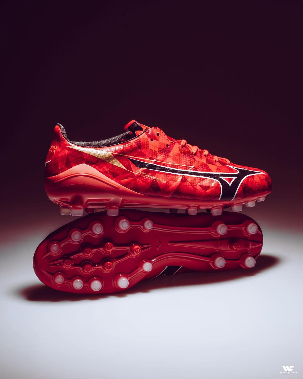Redefine performance on the pitch with the Mizuno α II JAPAN 'Ruby