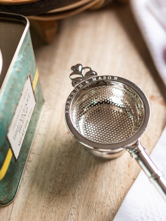 Silver-plated and featuring a bamboo-shaped handle, this Tea 