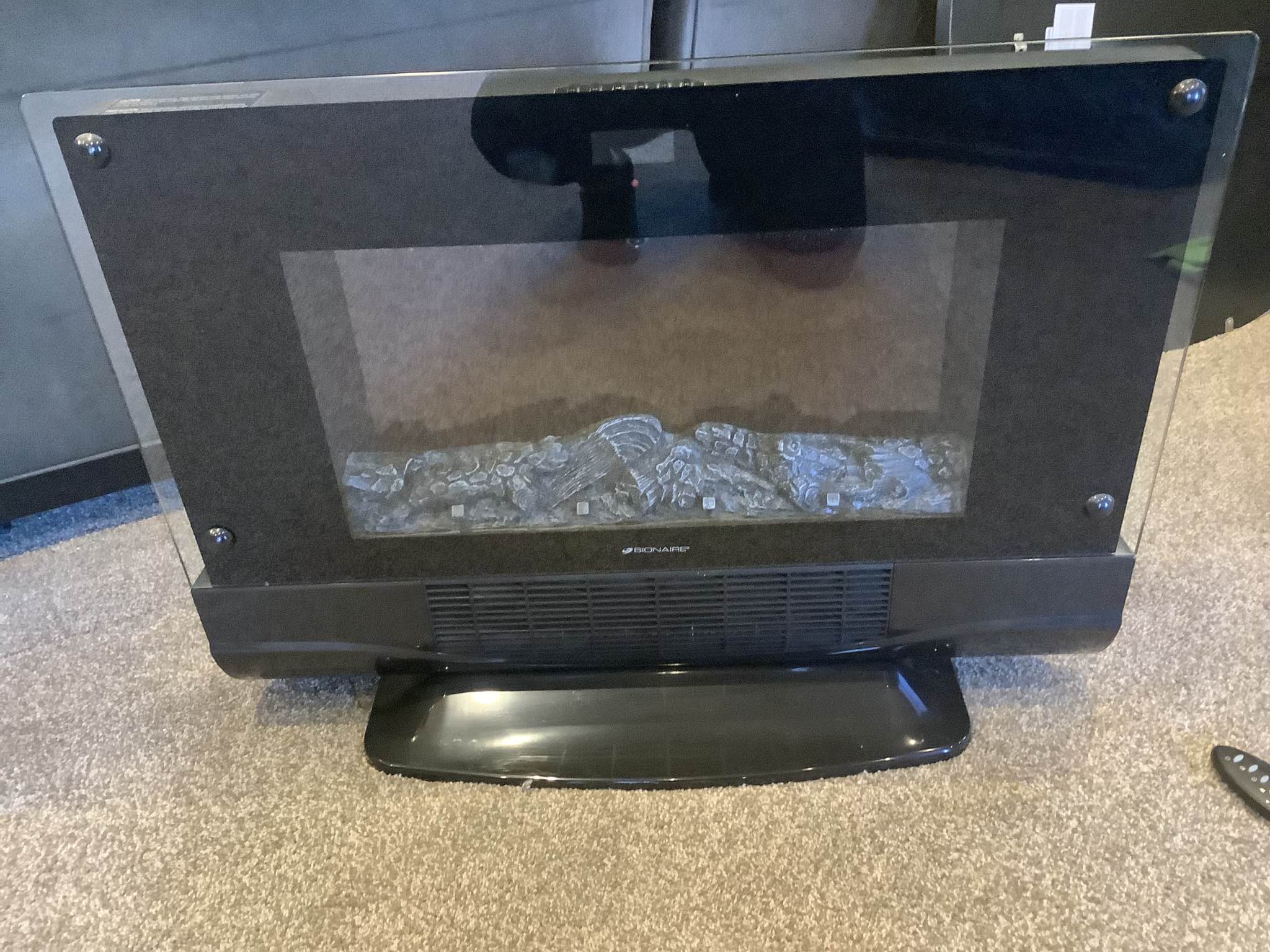 Bionaire 1500w electric fireplace / heater with remote - Space Heaters