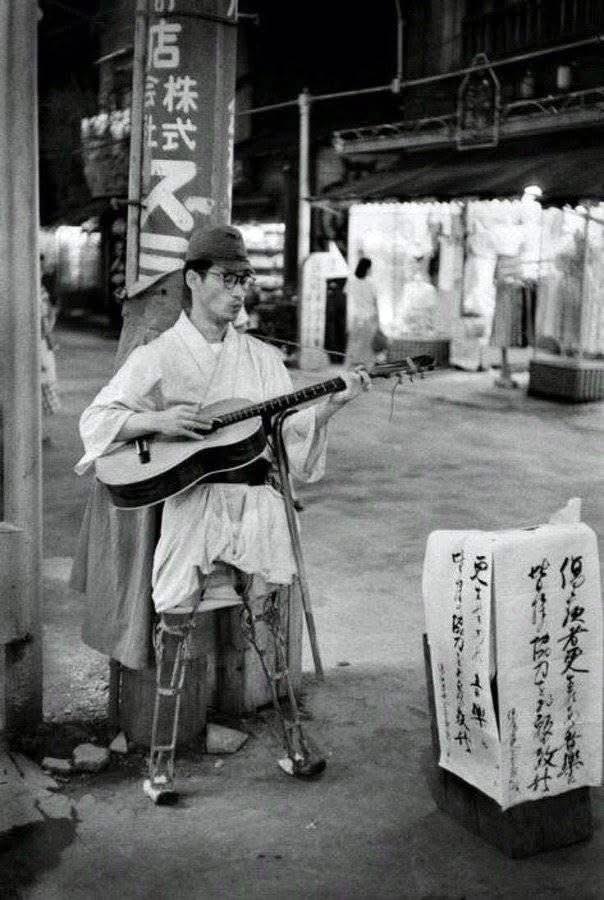 A powerful image from postwar Japan—this iconic 1950s Asakusa