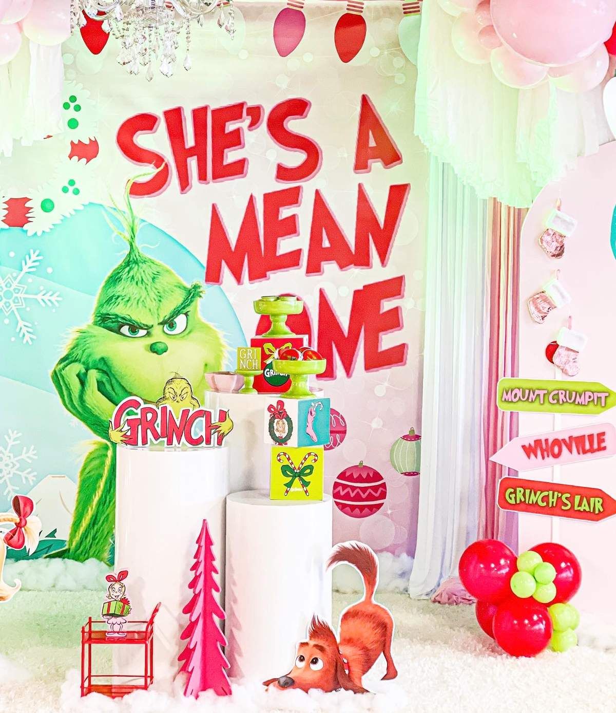 Check out this fun Grinch-themed 1st birthday Christmas party! The decor is awesome! https://www.catchmyparty.com/parties/shes-a-mean-one-grinch- birthday-party #catchmyparty #partyideas #thegrinch #thegrinchparty #christmasparty