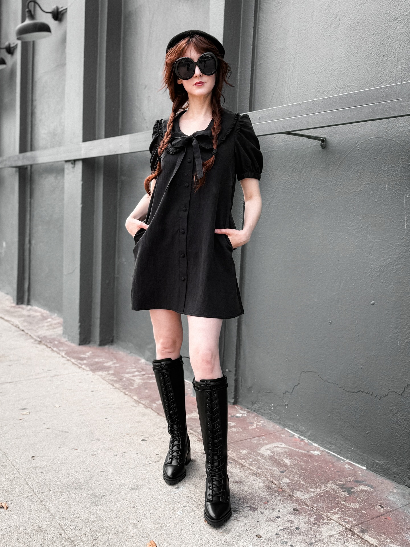 black leather babydoll dress The Valerie 🖤 This lil' mod has a functional button front, adjustable ties on the neckline, and POCKETS. Looks so cute paired with a beret & tall boots! Tap to st-bridesmaid-dresses