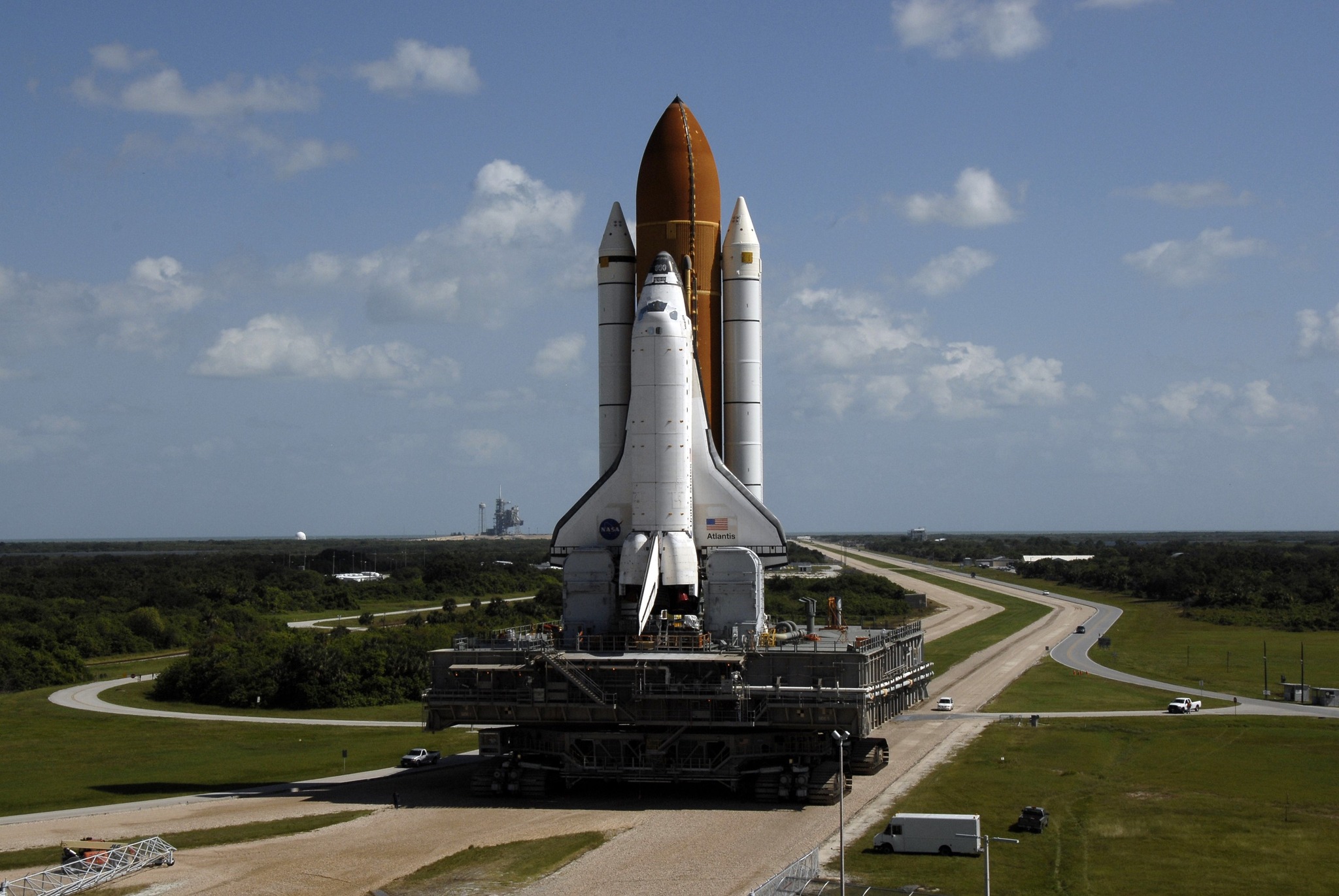Blast - Space shuttle Atlantis rolls via the crawlerway to the Vehicle ...