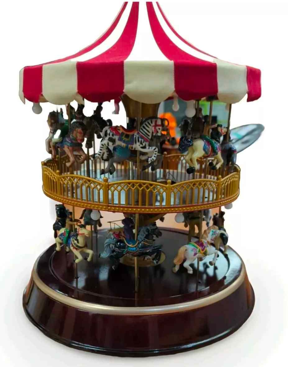Mr. Christmas Triple Decker Carousel, dated 2012. Animated three