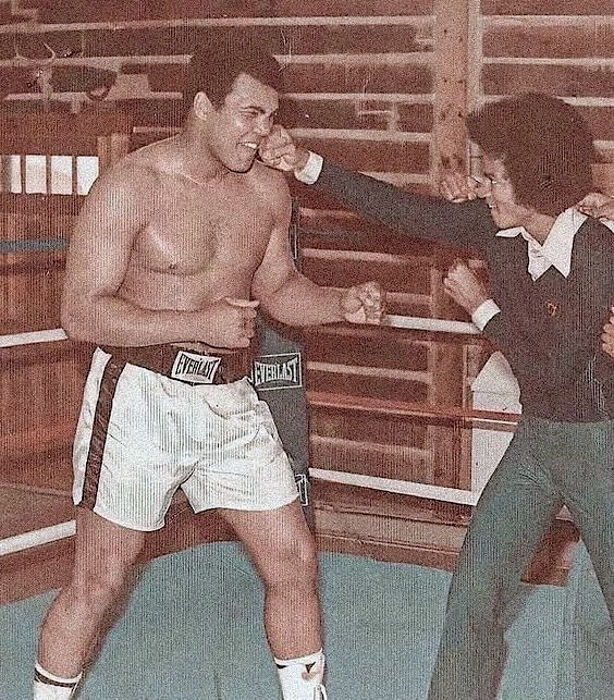 Muhammad Ali takes one on the nose from Michael Jackson at his