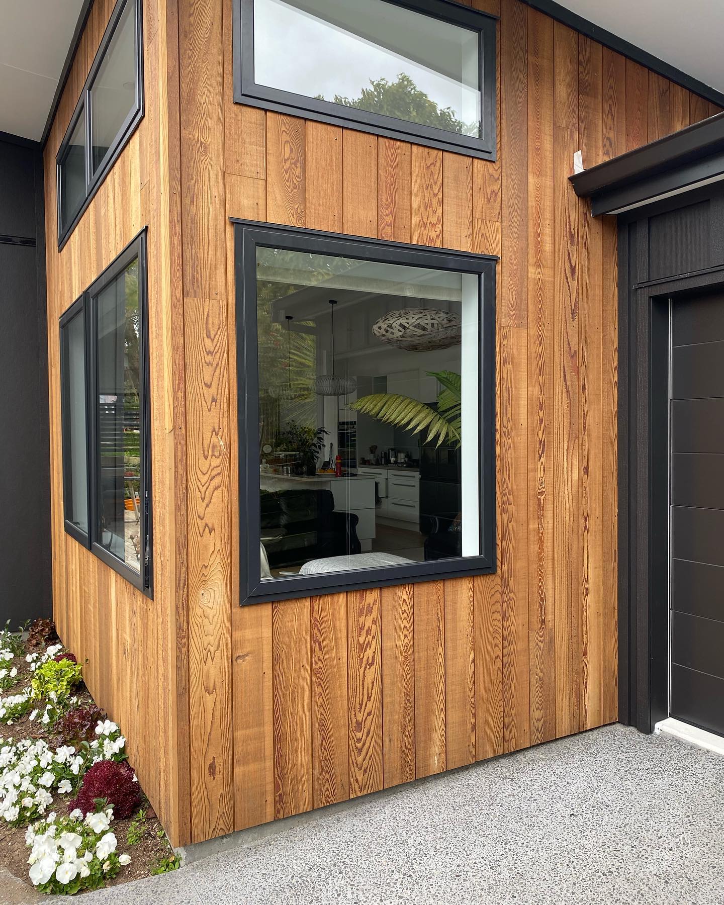 Wakefield Builders - The flaxpod joinery really makes an impact against ...