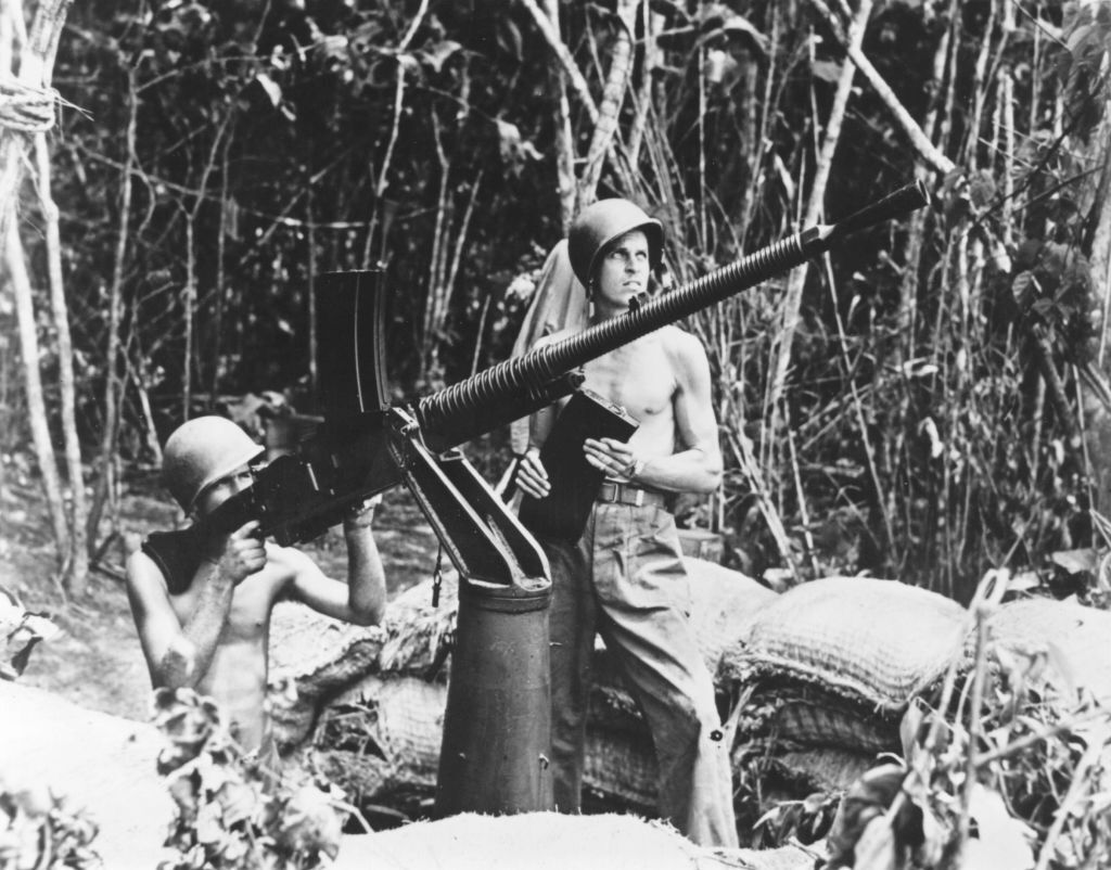 Two American Marines firing a... - War History Online | Facebook