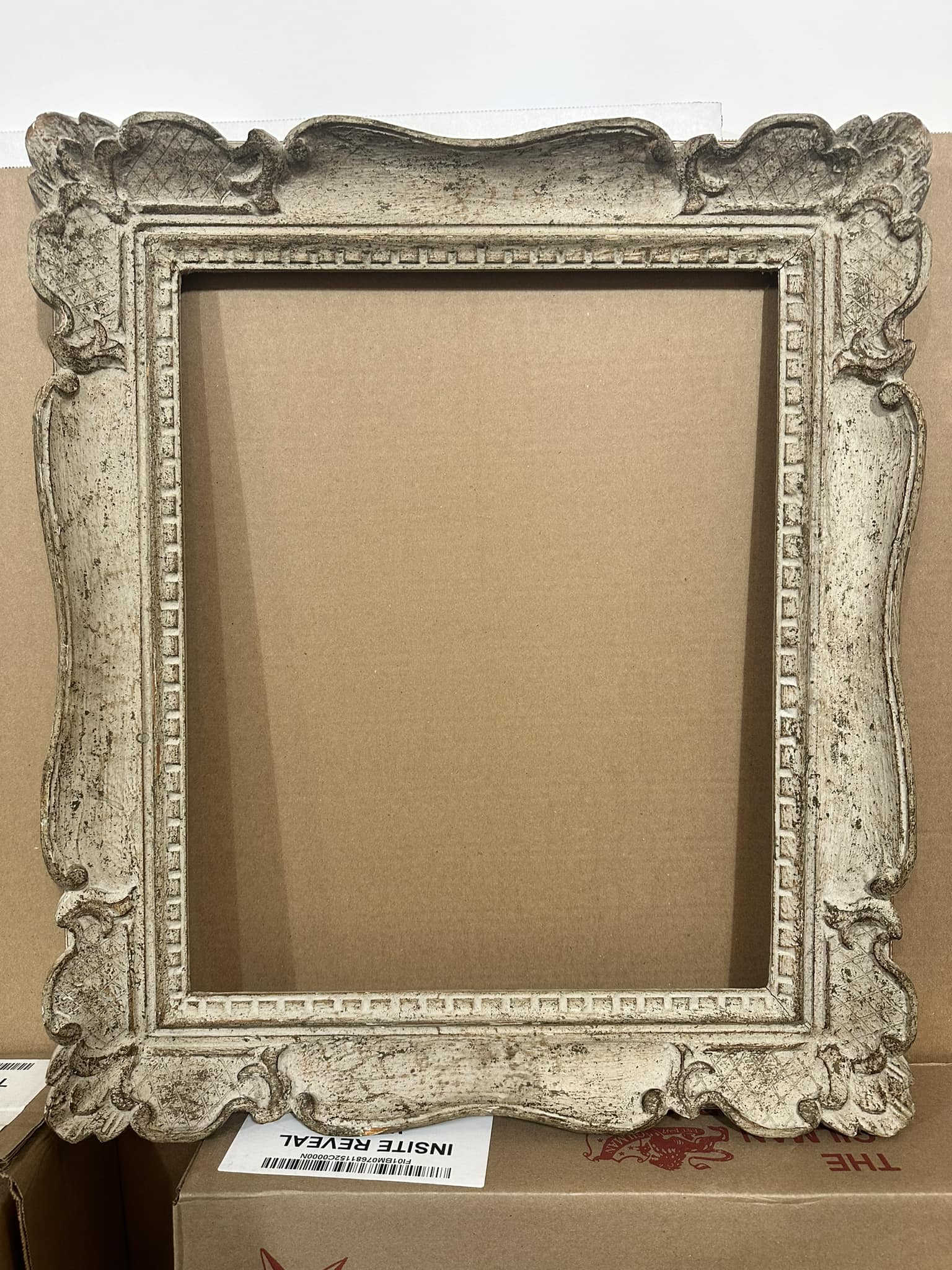 What is the value of this old French-style carved picture frame?