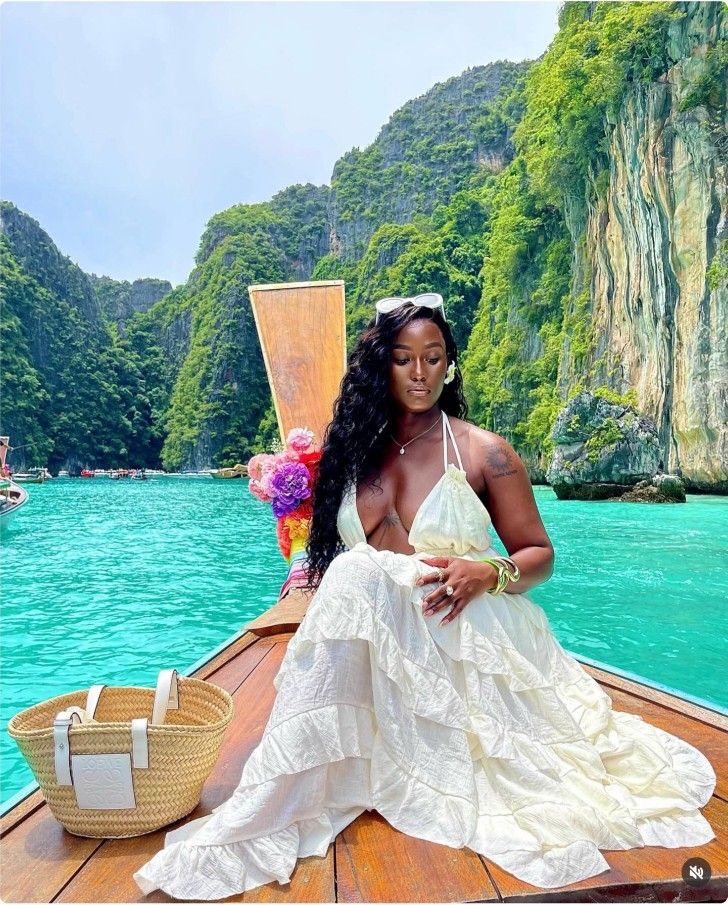 Girl, you have to see the Phi Phi Islands in person — pictures don't do her justice. 💙🌴✨