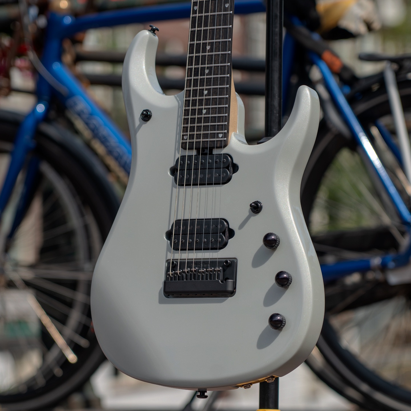 One of our exclusive @music_man JP15 7-strings in “Ketracel White