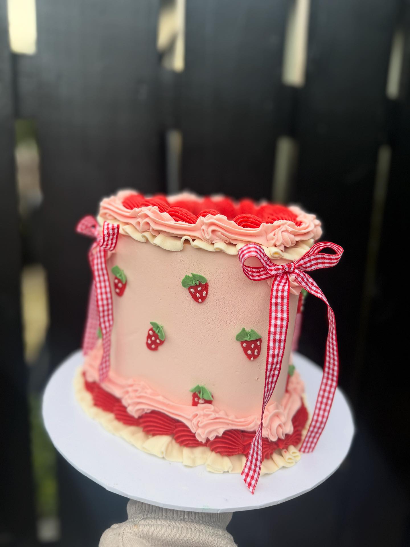 Berry first birthday? . Small heart cake with gingham ribbon 