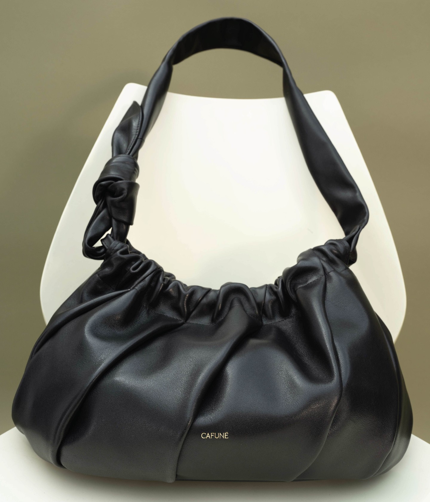 Soft Fold Bag in Black - a bag with sculptural fullness. Balanced