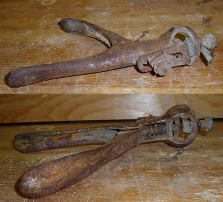 The Way - This handled tool has a spring and a screw on the top. Looks ...