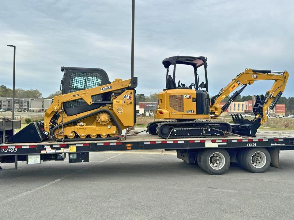 Riggs Cat - Riggs Cat added a new photo — with Caterpillar.
