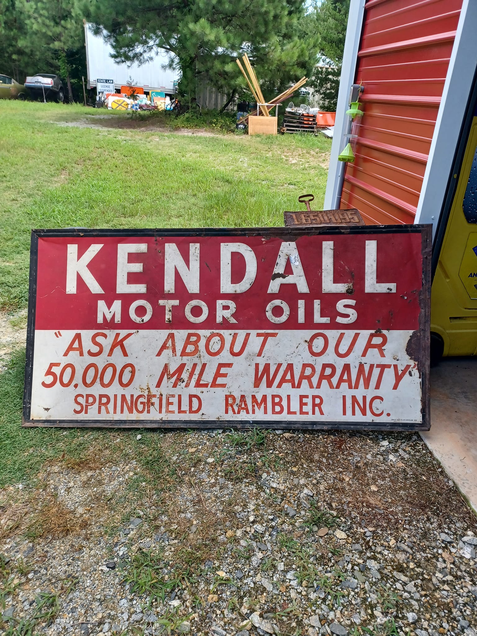 Kendall motor oil tie in on embossed metal sign