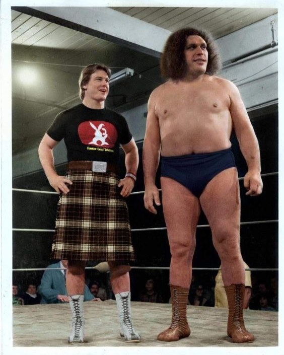 Andre the giant and Rowdy Roddy Piper, WWF 1970s.