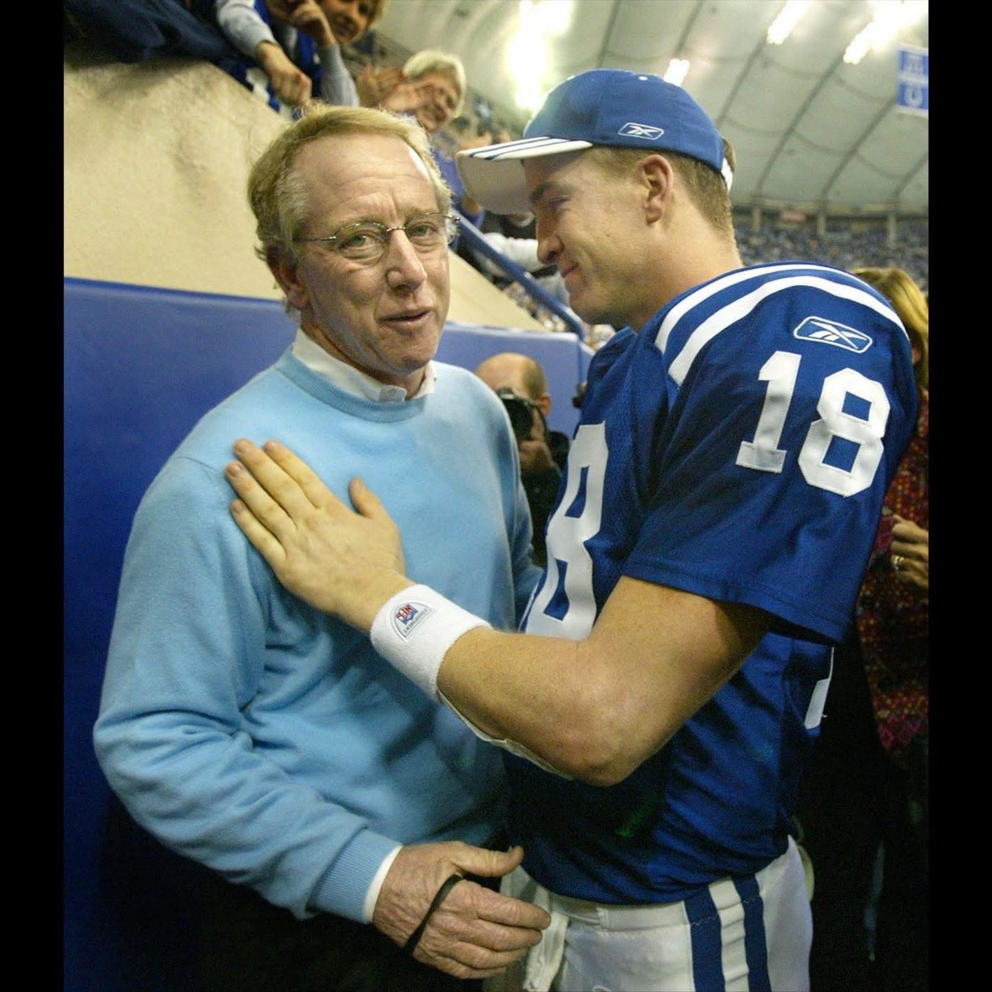 There - Peyton Manning gets a hug from his father Archie Manning after ...
