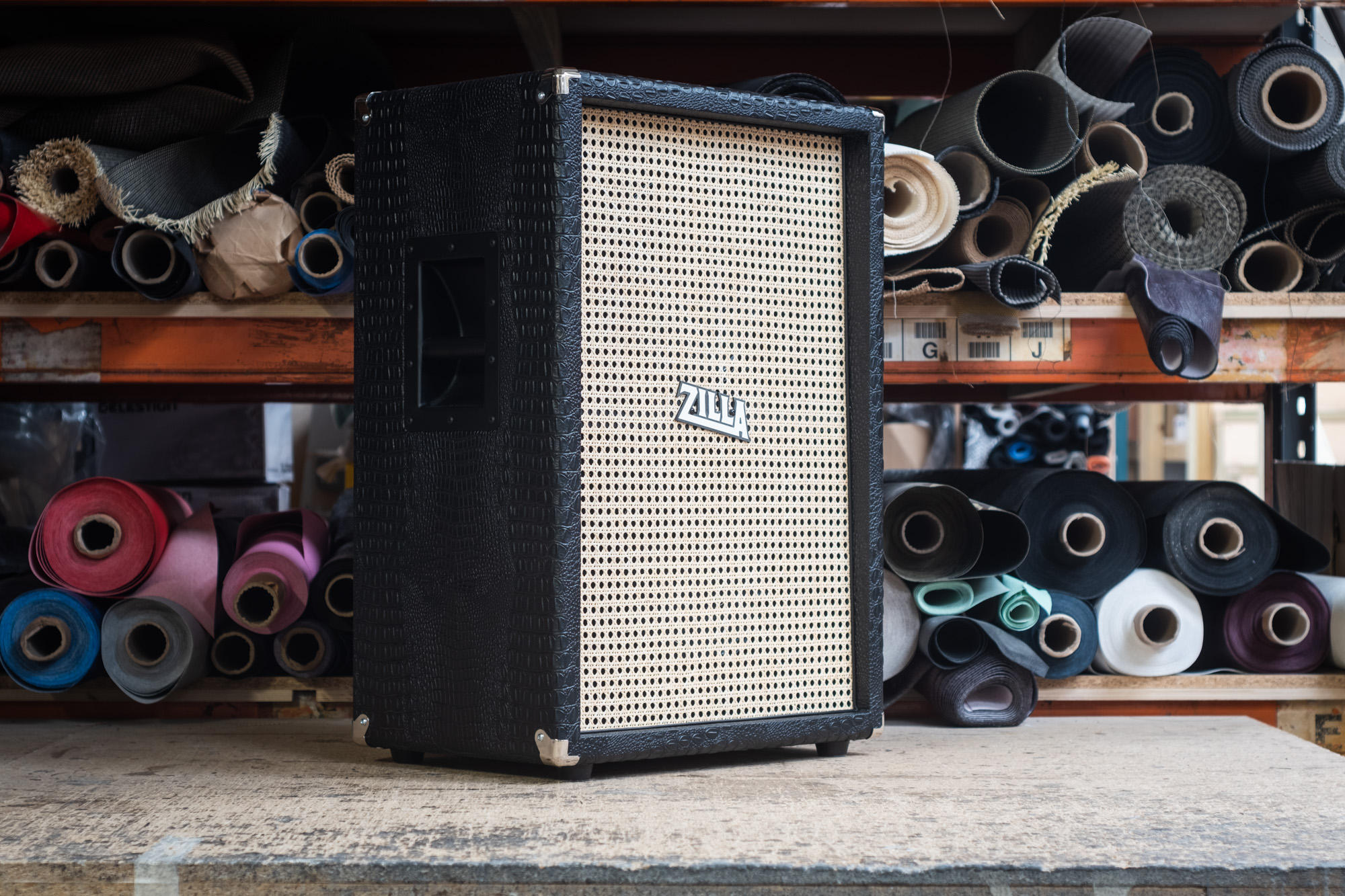 Oversize 4x12. Purple croc tolex with black grill, white piping