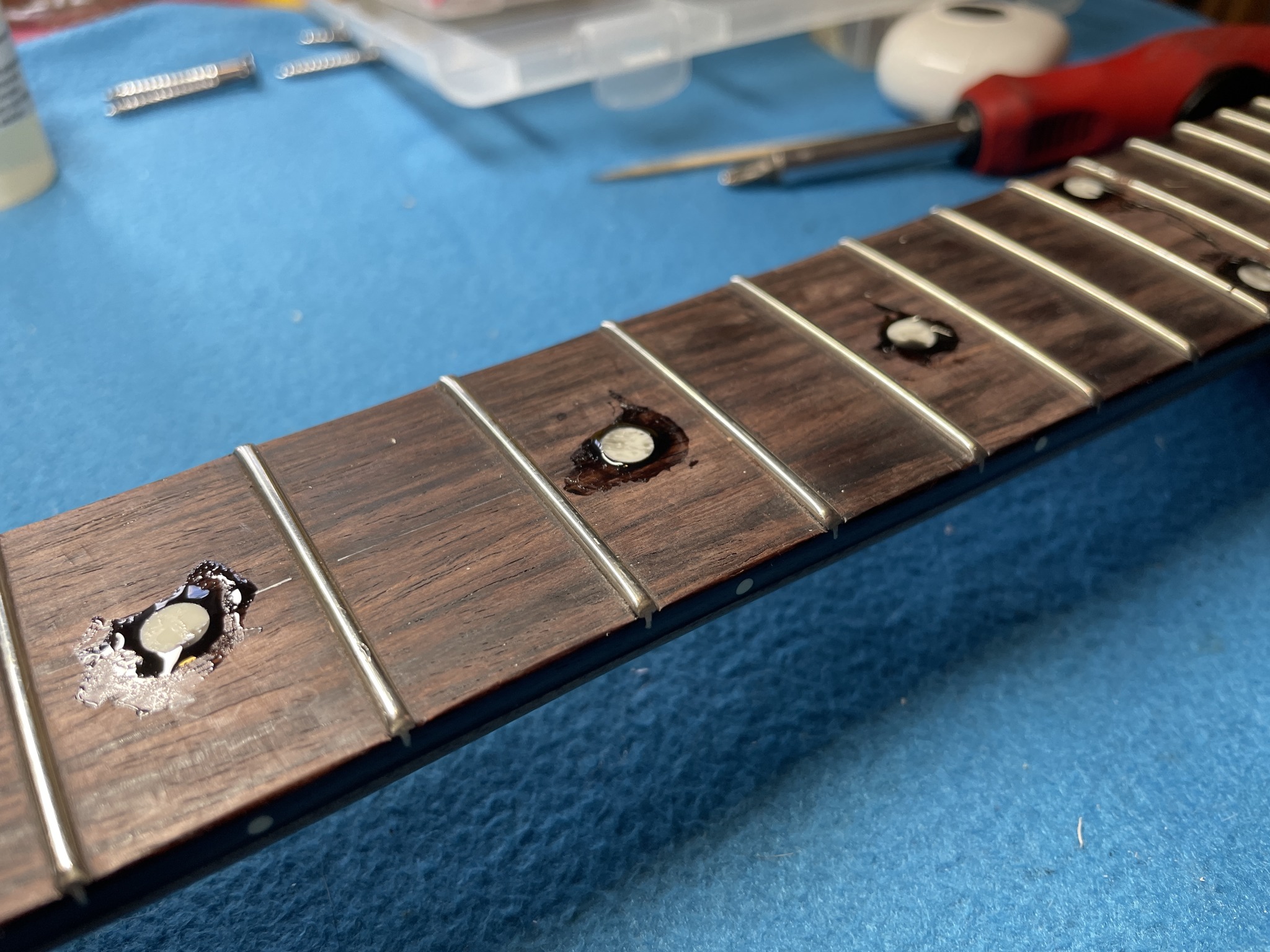 Replacing fret markers on a Tele guitar with clay dots