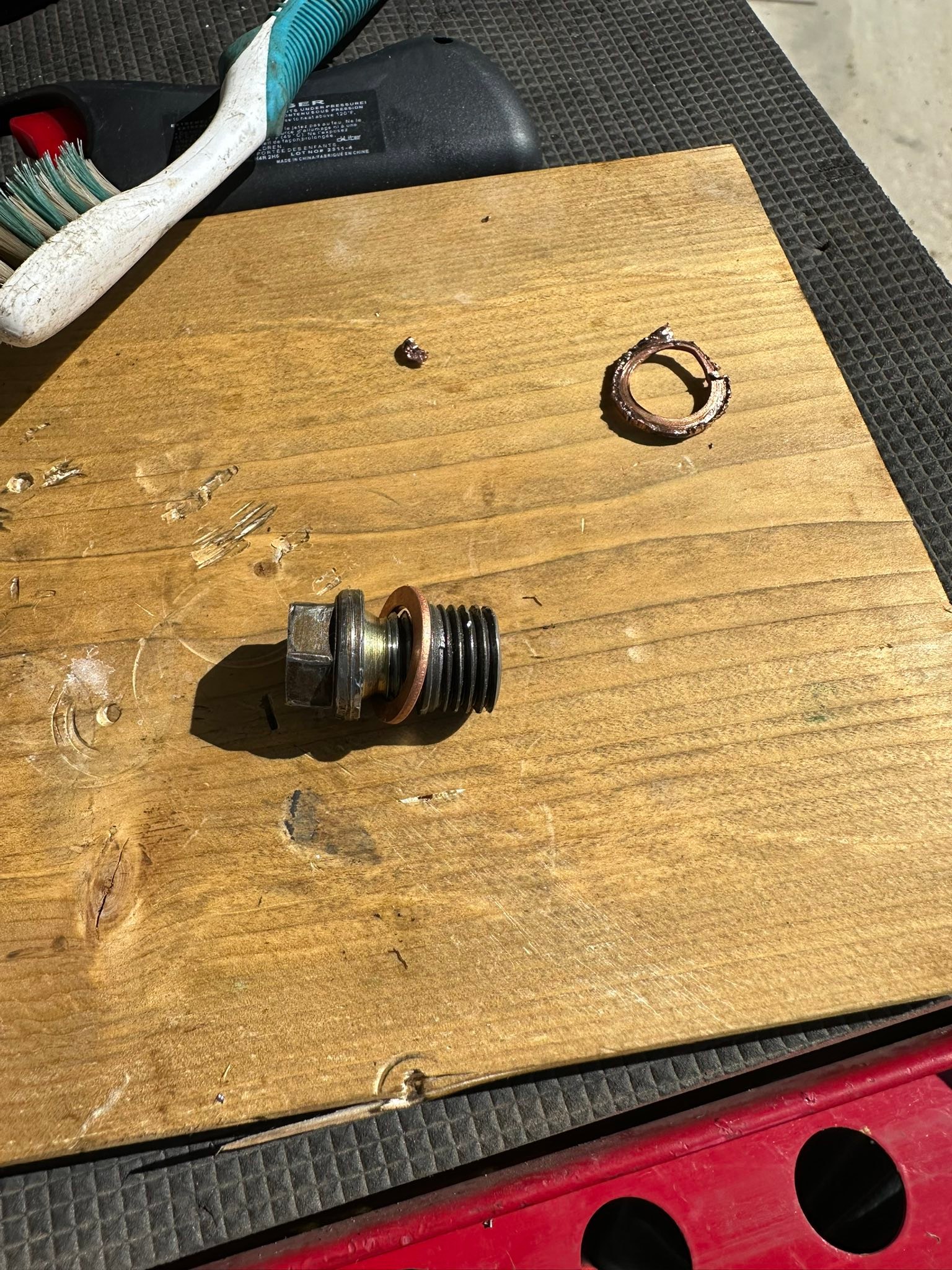 How to change the copper washer on a 2009 Can Am Outlander Max 800