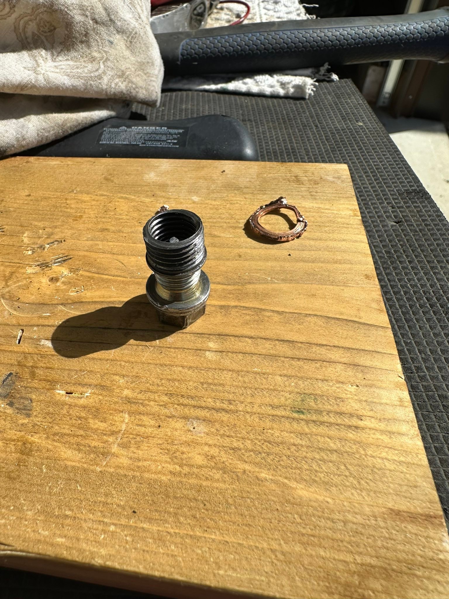 How to change the copper washer on a 2009 Can Am Outlander Max 800