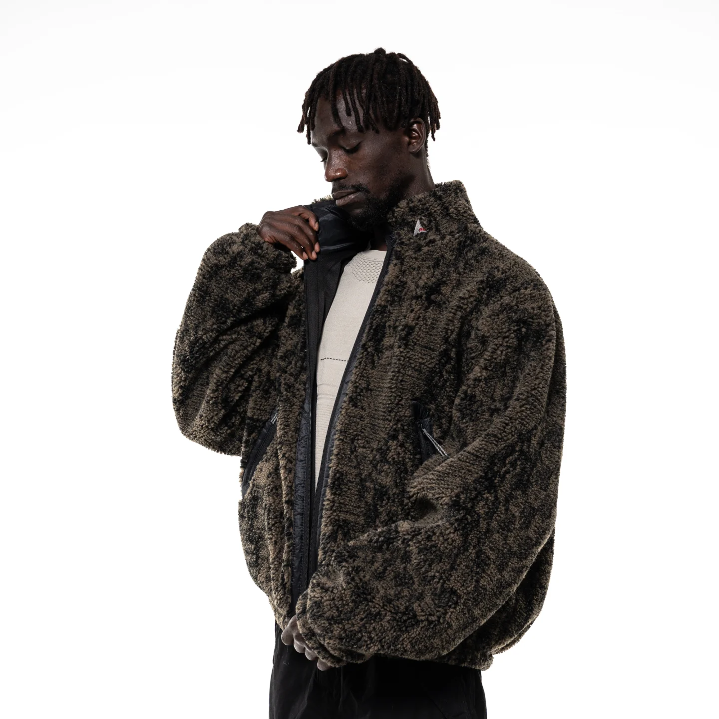 Roa Ewe Furry Jacket Olive, online and in store now. Model 